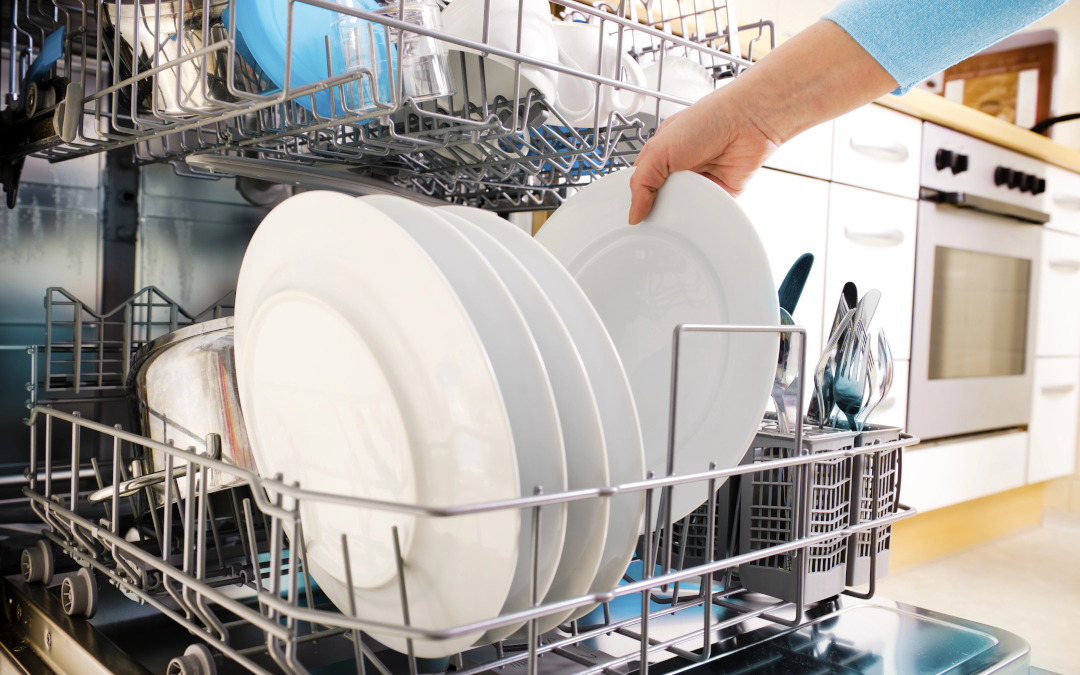 Washers Exempt From Heat Limits : person unloading dishwasher