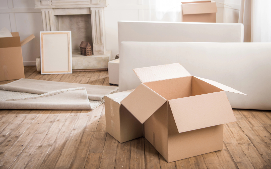 The Moving Process - open boxes in living room for moving